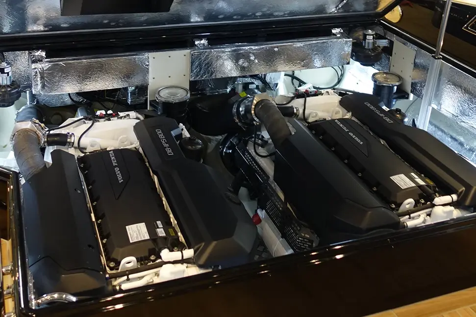 3xd6-600-engine-bay-3 Interior engine compartment with three Volvo Penta D6-600 engines and visible piping.