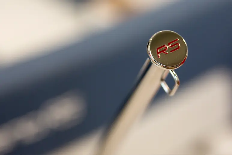 Exterior detail of the Windy 32 Grand Zonda: polished metal hardware with RS emblem.