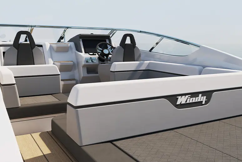 Windy 29 Huracán, vue du cockpit extérieur et du poste de pilotage avec sièges, volant et logo Windy.
