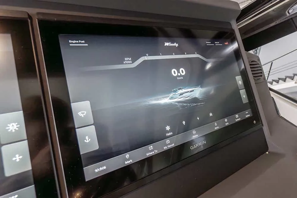 Interior of the Windy Camira 40 RS, Garmin navigation screen showing boat graphic and 0.0 knots speed.